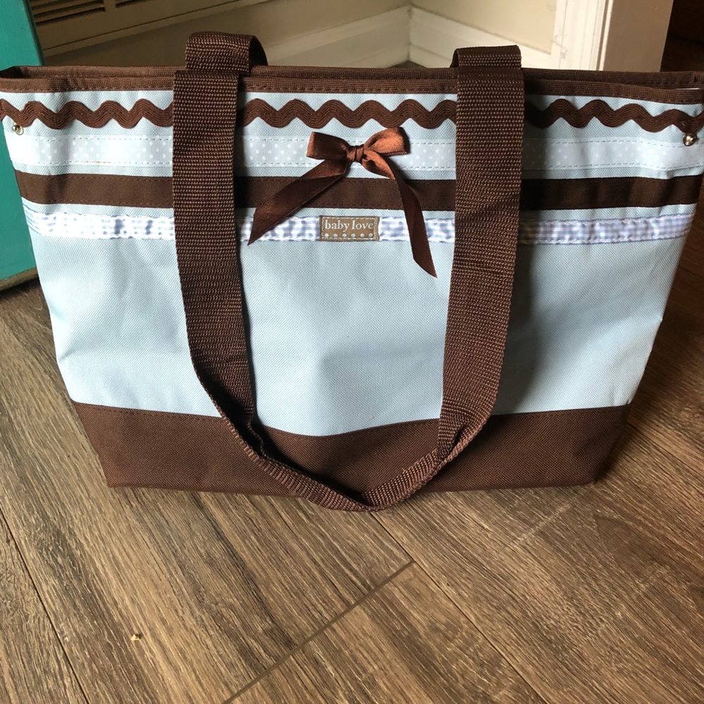 “Baby Love” diaper bag with matching changing pad